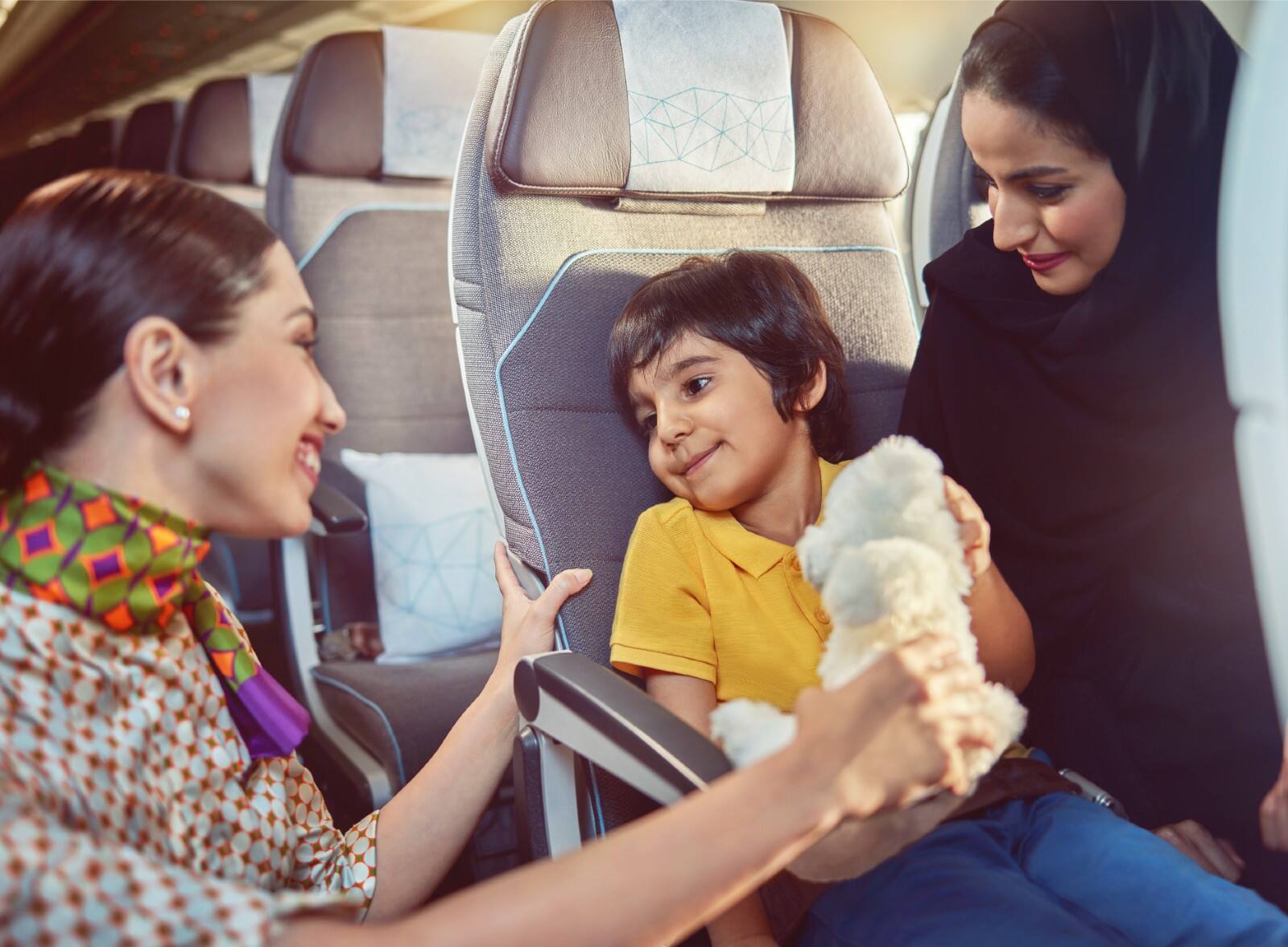 kid drawing on etihad activity book