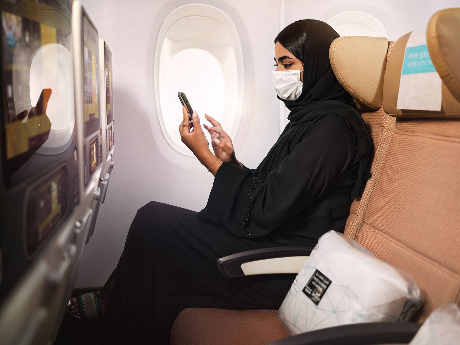 emirati woman in etihad economy space